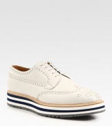 A sleek update on the classic wingtip oxford, crafted in Italy from smooth leather with an espadrille-style rubber sole.Leather upperLeather liningLeather soleMade in Italy