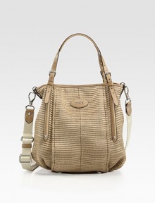 A soft, slouchy silhouette of finely-woven straw finished with rich leather trim and buckled straps.Adjustable double top handles, 5-9 dropAdjustable detachable shoulder strap, 15-22 dropTop snap closureOne inside zip pocketOne inside open pocketCotton lining12½W X 10H X 9½DMade in Italy