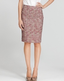 Head to the office in unabashed style in this Rachel Roy Signature pencil skirt. An exposed silver-tone side zip lends modern edge to the textured look.