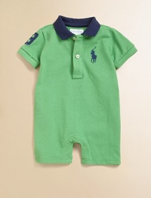 Short-sleeved polo shortall in soft, breathable cotton accented with a ribbed knit collar and applied twill 3 patch.Polo collarShort sleevesFront buttonsBottom snapsCottonMachine washImported Please note: Number of snaps may vary depending on size ordered. 