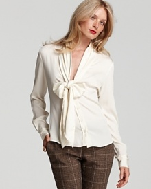 Exude office elegance in Rachel Zoe's chic v neck blouse, flaunting a bow-tie collar and rounded hem for refined femininity.