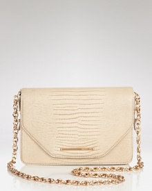 Rachel Zoe's lizard-embossed shoulder bag is a major take on the mini trend. With a removable strap, this bag does double-duty tucked under your arm an ultra-glam clutch.