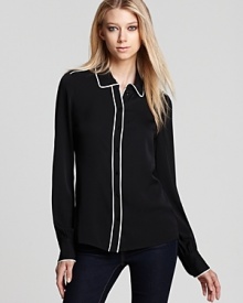 Add masculine edge to your wardrobe with this monochrome silk button down from Rachel Zoe.