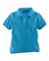 A short-sleeved polo shirt is cut in soft breathable cotton mesh.