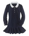 A comfortable pintuck dress in soft stretch cotton jersey is finished with ruffle details and a contrast collar for a pretty look.