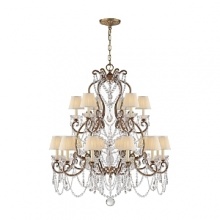 Glamour radiates from this medium-sized Ralph Lauren chandelabra, featuring eighteen bulbs topped with petite silk shades and draped with dazzling crystals.