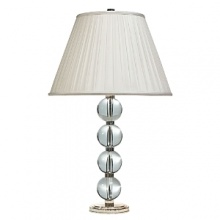 Fashioned after Art Deco styling, this appointed lamp includes polished silver fluted accents and solid glass balls.