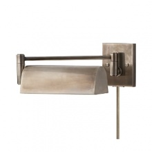 The classic design of this Ralph Lauren swing arm lamp gracefully sheds light on any space, and any task.