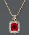 Royalty-inspired resplendence. A baguette-cut ruby (1-9/10 ct. t.w.) and surrounding diamonds (1/2 ct. t.w.) by Effy Collection ignite any look. Set in 14k gold. Approximate length: 18 inches. Approximate drop length: 3/4 inch. Approximate drop width: 1/2 inch.