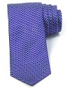 A simple pattern of small geometric shapes creates a textural appearance on this luxurious Italian silk tie from HUGO.