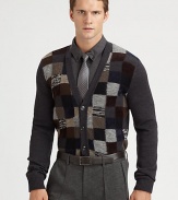 Multicolored patchwork design elevates a classic cardigan shaped in superior wool.Button-frontRibbed cuffsWoolDry cleanImported