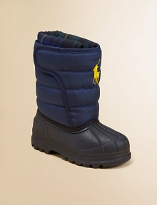 Essential snow boots with a durable, waterproof rubber foot and a solid channel-quilted nylon shaft features a removable, warm plaid sock.Grip-tape closureNylon upperFleece liningRubber solePadded insoleImported