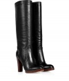 With their clean lines and sleek polished leather, Kors Michael Kors stacked heel tall boots as chic as they are versatile - Round toe, puffed seams, natural stacked leather blocky heel and micro platform - Knee height - Wear with everything from knit dresses and carryall totes to leather leggings and oversized cashmere pullovers