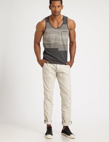 A basic striped tank gets an innovative update with engineered stripes and a simple patch pocket, in a soft poly cotton blend.Scoop neckChest patch pocket50% polyester/38% cotton/12% modalMachine washImported