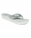 Are you a GUESS Girl? The Scarletta EVA thong sandals blend casual and glam with metallic shine and shimmery sequins.