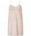 Stylish camisole slip dress in nude silk and silk chiffon - Elegant gathering under the bust (empire effect) - Very slim spaghetti straps - The slip dress falls loose, yet fits snug - Stylish, yet sexy too, also wonderfully comfortable, thanks to the stretch content - Pair with the matching briefs