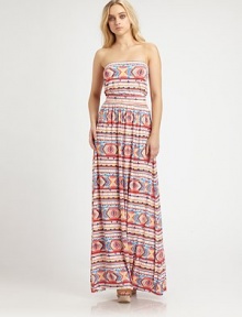 For a casual-cool spring look that is sure to turn heads, this floor-sweeping maxi dress in a bold, vibrant print is the perfect choice. StraplessBuilt-in bra for added supportBanded elastic waistAllover graphic printAbout 62 from natural waist92% modal/8% spandexDry cleanMade in USAModel shown is 5'9 (176cm) wearing US size Small.