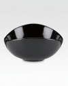 Donna Karan launched her eponymous fashion label in 1985 with seven easy pieces meant to to be mixed and matched to fit any scenario. That same versatility defines her beautiful dinnerware collection, crafted in high-gloss porcelain with seven pieces for breakfast, dinner and everything in between. High-gloss porcelain24.5 oz.Dishwasher- & microwave safeImported