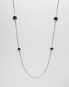 Faceted black onyx stones set in sleek sterling silver on a long link chain. Black onyxSterling silverLength, about 38Lobster clasp closureImported 