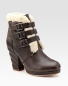 Soft leather look with a uniquely twisted heel, a trio of buckles and plush shearling trim. Self-covered heel, 4 (100mm) Covered platform, ½ (15mm) Compares to a 3½ heel (90mm) Leather and shearling upper Leather lining and sole Padded insole Imported