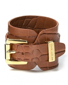 MICHAEL Michael Kors' luxe leather bracelet defines cuff love. With texture a major trend, slip on this showpiece to give polished staples a covetable tactile touch.