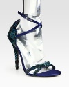 Shoe visionary Stuart Weitzman completes this strappy satin silhouette with exotic peacock feathers for a vibrant, cocktail-ready look. Feather-coated satin heel, 4½ (115mm) Satin and peacock feather upperLeather lining and solePadded insoleImportedOUR FIT MODEL RECOMMENDS ordering true size. 