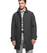 Battle the elements. This raincoat from Calvin Klein lets you face any day with sleek, streamlined style.