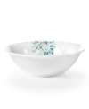 Romance blossoms at tables with the Silk Floral fruit bowl. Modern, fuss-free porcelain from Mikasa bears artsy garden blooms in teal and cream for a look of serene grace and femininity.