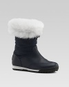 Fluffy fur cuffs cold weather boots with GG fabric shafts and curly shearling linings.Nylon upper Shearling lining Rubber sole Made in Italy