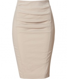 The ultimate pencil skirt, this flattering Donna Karan favorite will keep you turning heads while maintaining comfort - Pencil silhouette, front draped pleating, seaming details, back slit, concealed back zip closure - Pair with a silk blouse, fishnets, and platform pumps