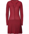 Pretty daytime looks get an edge of school-cool flair in Hoss Intropias merino wool dress, perfectly proportioned with a long, lean bodice and sharply pleated skirt - Rounded neckline with slit, long sleeves, dropped waistline, form-fitting top - Pair with statement accessories and chunky jewelry