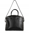 Sleek an sophisticated with its covetable rockstud trim, Valentinos studded leather tote is a smart investment perfect for adding that iconic luxe edge to your look - Embossed logo, double top handles, platinum-toned rockstud trim and hardware, inside zippered back wall pocket, two front wall slot pockets, protective feet - Carry as an immaculate polish to day and evening looks alike