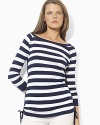 Bold stripes grace the front of a three-quarter-sleeve tee, crafted with an elegant ballet neckline and drawcord detailing at the hem to create chic ruching.