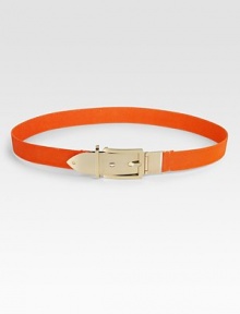 Be bold and whimsical with this elastic style accented with a shiny metal buckle and tip. Width, about 1Made in Italy