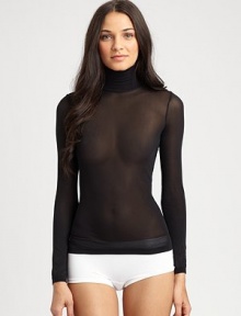 Wear this seductively sheer design on its own or under a blazer for a fresh, modern update. TurtleneckLong sleevesSheer with a hint of sheen92% polyamide/8% elastaneMachine wash or hand washMade in Austria