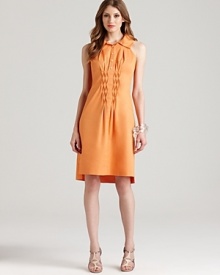 In a zingy citrus hue, this Elie Tahari dress energizes your 9-to-5 style. Perk up the look with sleek silver accents and take it after hours.