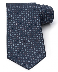 A neat and fancy gancini pattern, on a classic Salvatore Ferragamo silk tie.