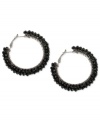 This time with feeling. Black beads give texture to this pair of hoop earrings from Haskell. Crafted from hematite-tone mixed metal.  Approximate diameter: 2 inches.