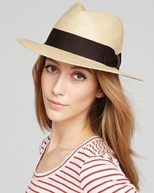 Keep your cool in a woven flat brim hat with bow and black ribbon trim.