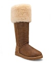 A wide shearling cuff adds cozy style to the classic suede Bailey boot from UGG® Australia.