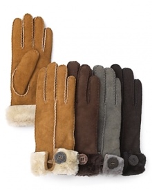 Classic shearling lends cozy style to these cuffed gloves from UGG® Australia. A signature button adds a sophisticated finish.