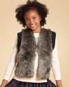 With a lush faux-fur front and a chunky knit back, this textural vest is a just-right blend of cozy and chic.Open front with button closureSleeveless with ribbed trimCotton liningFaux-fur front: 67% acrylic/17% modacrylic/16%polyesterSweater back: 63% acrylic/20% polyester/17% modacrylicDry cleanImported