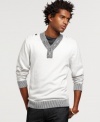 With a cool dose of laid-back collegial style, this sweater from Bar III reworks your casual wardrobe the right way.