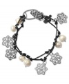 Knot your typical bracelet. Lucky Brand's leather bracelet features semi-precious crystal quartz and silver tone openwork charms on a knotted leather cord. Approximate length: 7-1/2 inches.