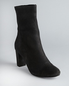 Streamlined stretch and sensual suede define these See by Chloé flat booties.