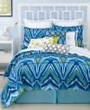 Taking inspiration from the regal peacock, this duvet cover set from Trina Turk features an abstract peacock feather design. Vibrant blue and green tones complete this bold, ultra-modern look. Button closure.