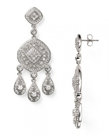 Striking crystals and rhodium plate form an eye-catching cascade on these chandelier earrings from Nadri. Slip in these stunners as a sophisticated final touch.