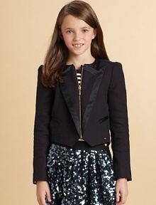 A tux deluxe for your little lass, complete with a swallowtail hem.Jewel necklineZip frontSatin-edged peaked lapelsSatin-piped welt pocketsLong sleeves with button detailed cuffsButtoned belt at back waistCotton/SpandexDry cleanImported