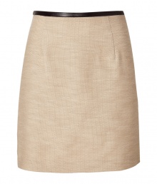 Elegant mini skirt in fine, vanilla cotton and silk blend - Slim, modified A-line silhouette - Decorative seams at front and back - Chic contrast leather trim at waist - Hits above the knee - Zips at side - Flattering, polished and versatile - Pair with a button down and blazer at work, or gor for a dressier look at night with a silk tank and wedge sandals