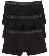 BOSS Black brings you a three-pack of essential cotton boxers, complete with a logo waistband.